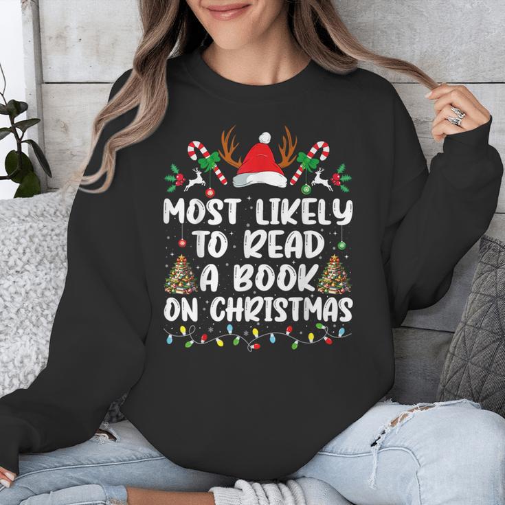 Most Likely To Read A Book On Christmas Matching Family Unisex Sweatshirt
