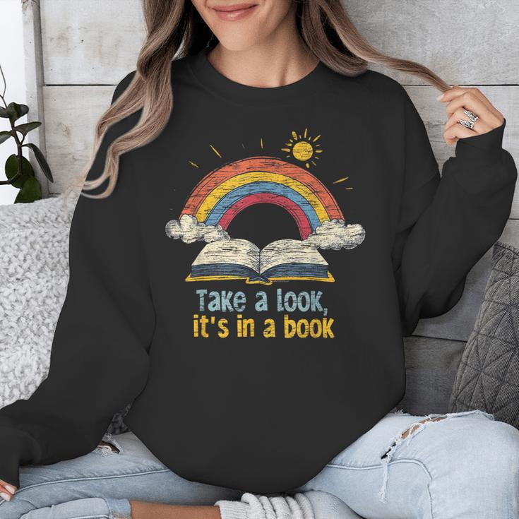 Take a Look It's In a Book Vintage Reading Teacher Rainbow Unisex Sweatshirt Take a Look It's In a Book Vintage Reading Teacher Rainbow Unisex Sweatshirt