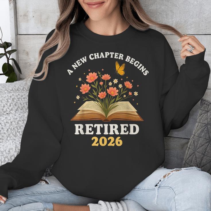 A New Chapter Begins Retired 2026 Floral Book Butterfly Tee Unisex Sweatshirt