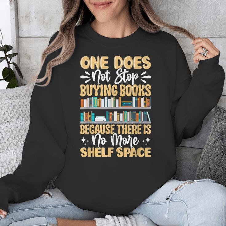 One Does Not Stop Buying Books Because There Is No More Shel Unisex Sweatshirt
