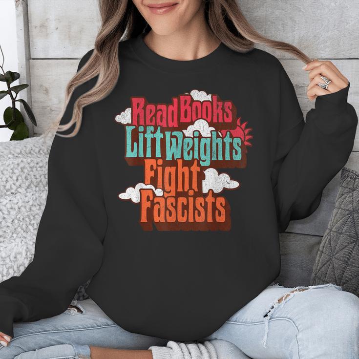 Read Books Lift Weights Fight Fascists Reading No Kings Unisex Sweatshirt Read Books Lift Weights Fight Fascists Reading No Kings Unisex Sweatshirt
