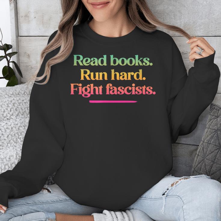 Read Books Run Hard Fight Fascists Unisex Sweatshirt