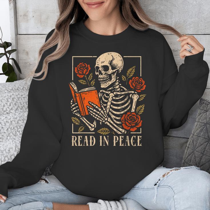Read In Peace Skeleton Reading Book Halloween Teacher Unisex Sweatshirt