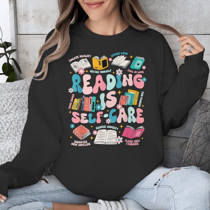 Reading Is Self-Care Book Lover Teacher Student Men Women Unisex Sweatshirt