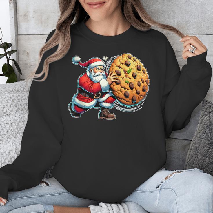 Santa Holding Cookie Xmas Baker Introvert Christmas Unisex Sweatshirt