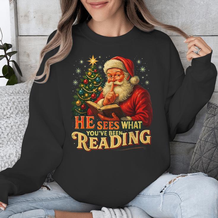 He Sees What You’Ve Been Reading Santa Book Lover Christmas Unisex Sweatshirt He Sees What You’Ve Been Reading Santa Book Lover Christmas Unisex Sweatshirt