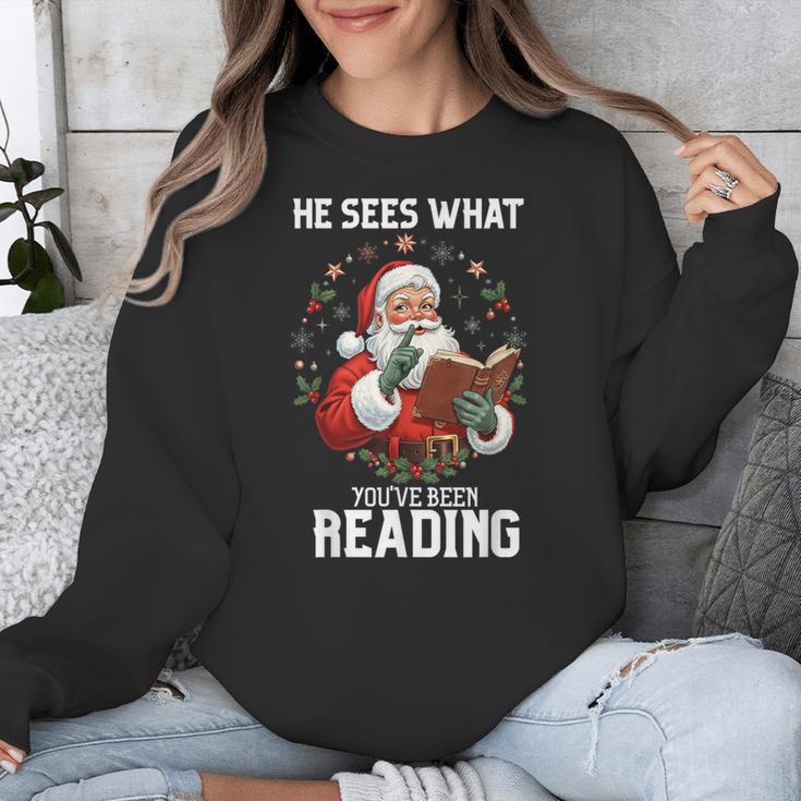 He Sees What You'Ve Been Reading Santa Book Lover Unisex Sweatshirt