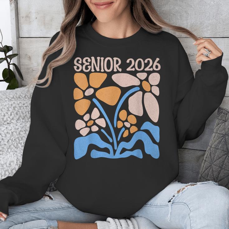 Senior 2026 Retro Groovy Flowers Graduation Unisex Sweatshirt