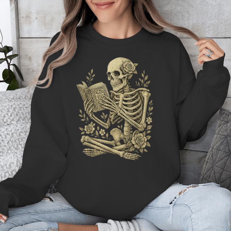 Skeleton Book Floral Skull Halloween Teacher Costume Unisex Sweatshirt Skeleton Book Floral Skull Halloween Teacher Costume Unisex Sweatshirt