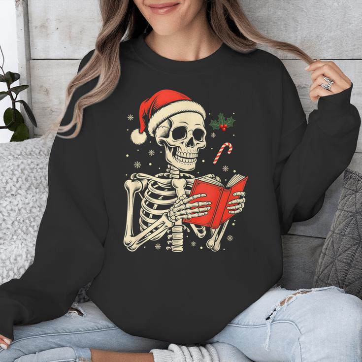 Skeleton Reading Book Christmas Teacher Librarian Book Lover Unisex Sweatshirt