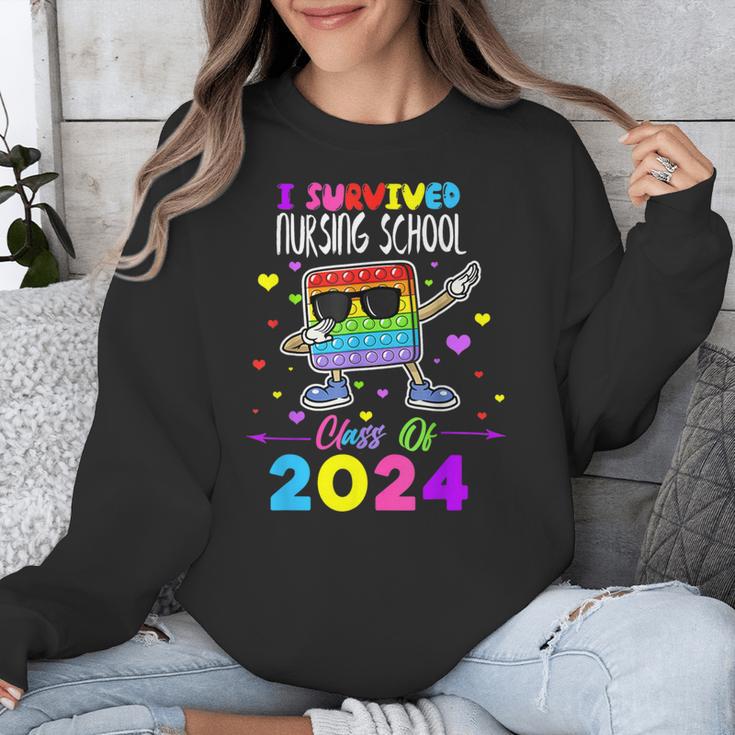 I Survived Nursing School Of 2024 Student Graduation 2024 Unisex Sweatshirt