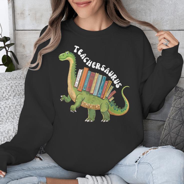 Teachersaurus Dinosaur Teachers Dino Reading Book Librarian Unisex Sweatshirt Teachersaurus Dinosaur Teachers Dino Reading Book Librarian Unisex Sweatshirt