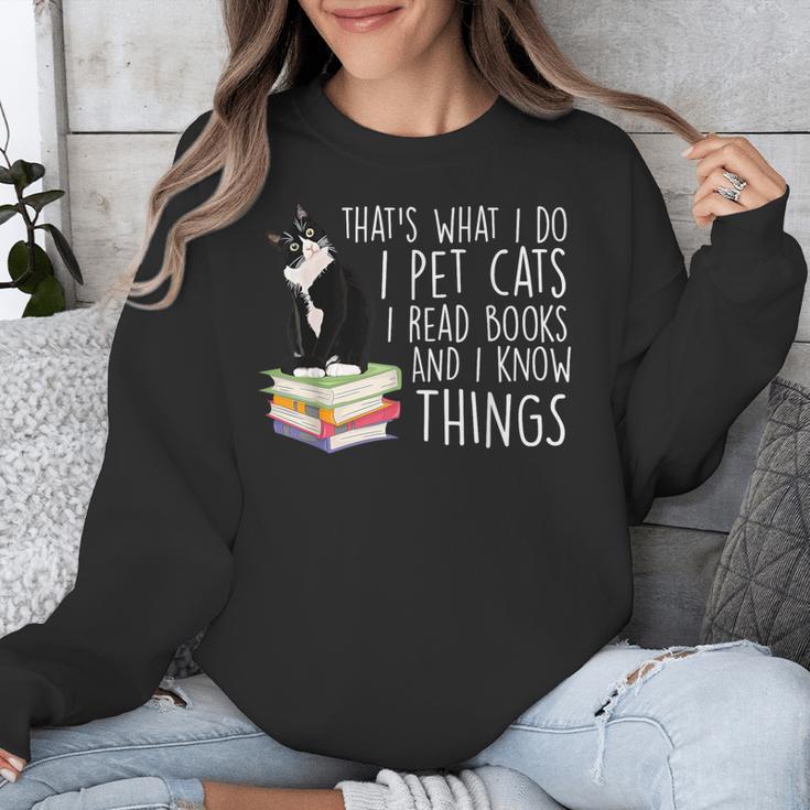 That's What I Do I Pet Cat I Read Books Tuxedo Cat Bookworm Unisex Sweatshirt