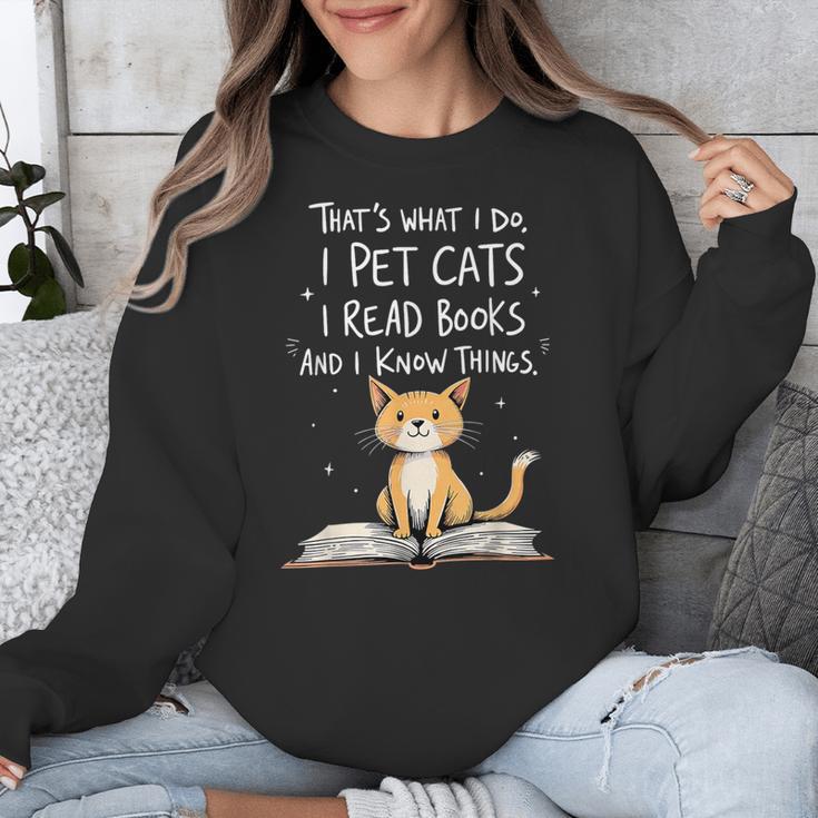 That's What I Do I Pet Cats I Read Books And I Know Things Unisex Sweatshirt