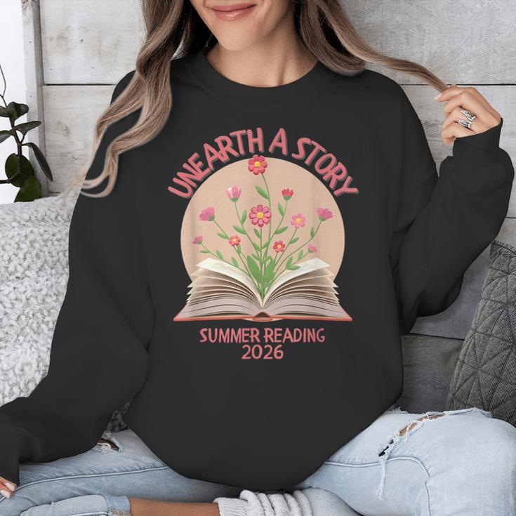 Unearth a Story 2026 Summer Reading Program Flowers Book Unisex Sweatshirt Unearth a Story 2026 Summer Reading Program Flowers Book Unisex Sweatshirt