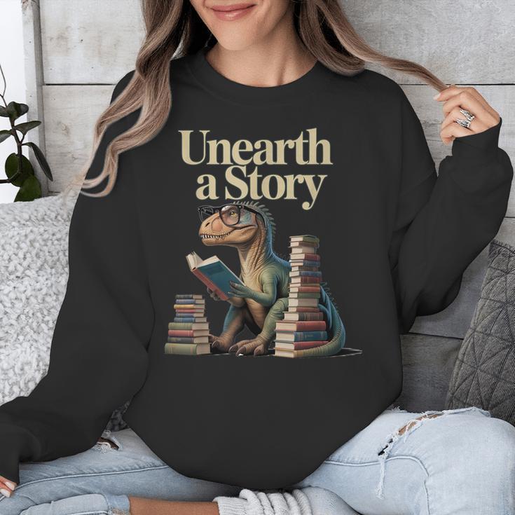 Unearth A Story Dinosaur Reading a Library Book Unisex Sweatshirt