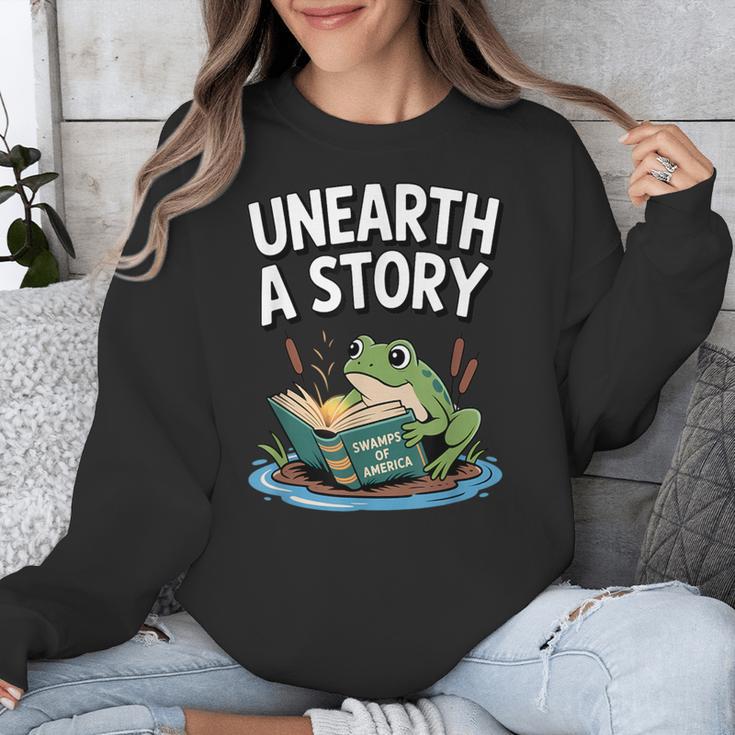 Unearth a Story Frog Reading a Book Summer 2026 Unisex Sweatshirt