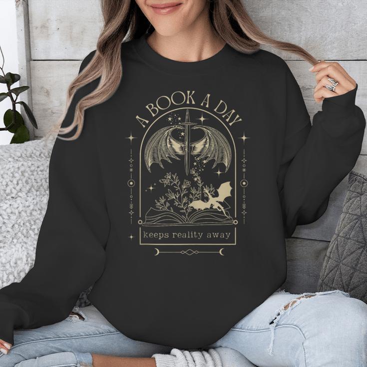Vintage A Book a Day Keeps Reality Away Spicy Book Readers Unisex Sweatshirt