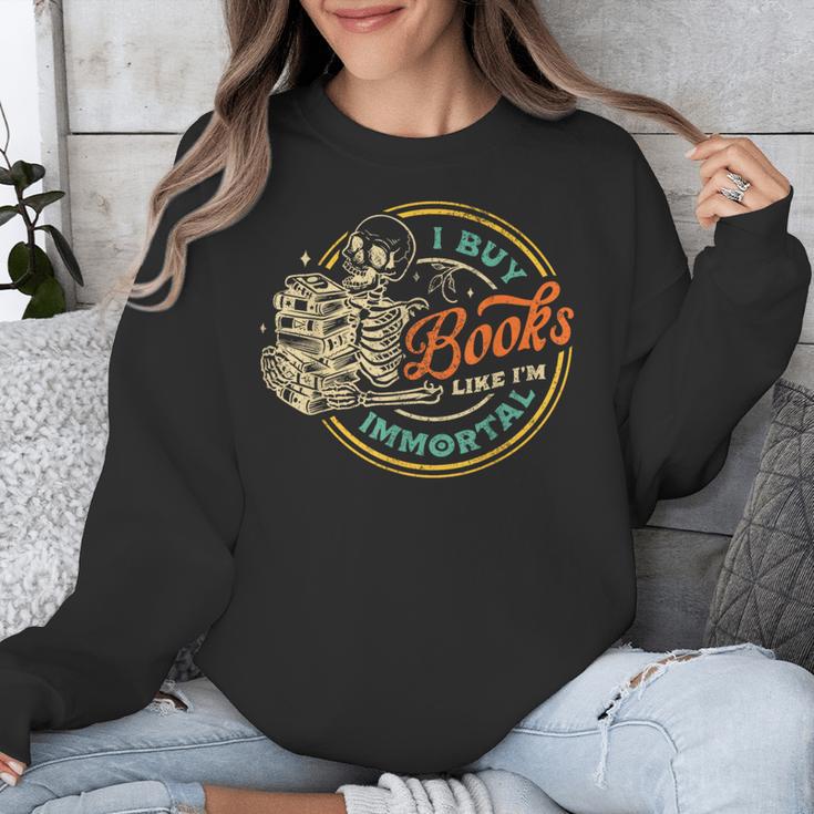 Vintage I Buy Books Like I'm Immortal Skeleton Reading Book Unisex Sweatshirt