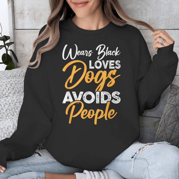 Wears Loves Dogs Avoids People I Introvert Unisex Sweatshirt