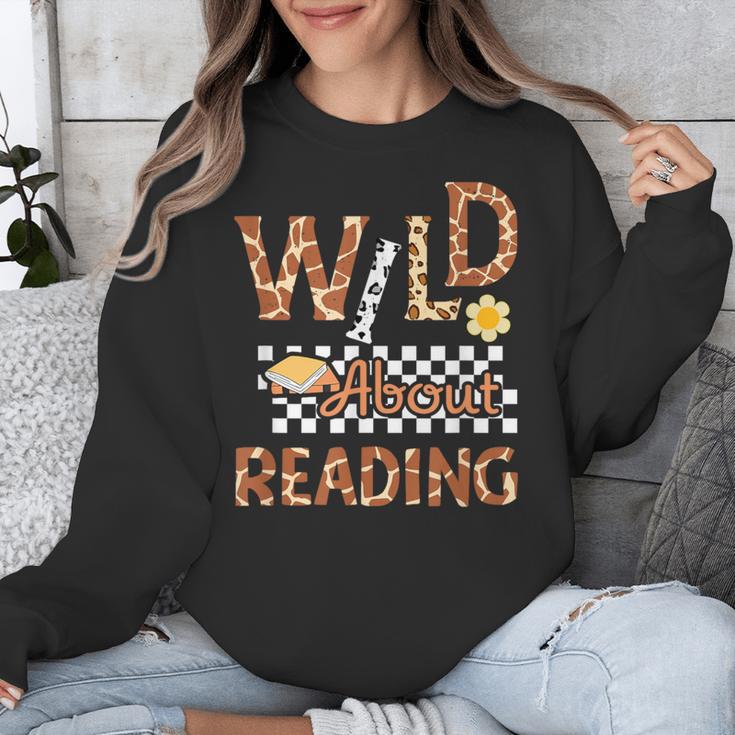 Wild About Reading Teacher Reading Books Back To School Unisex Sweatshirt