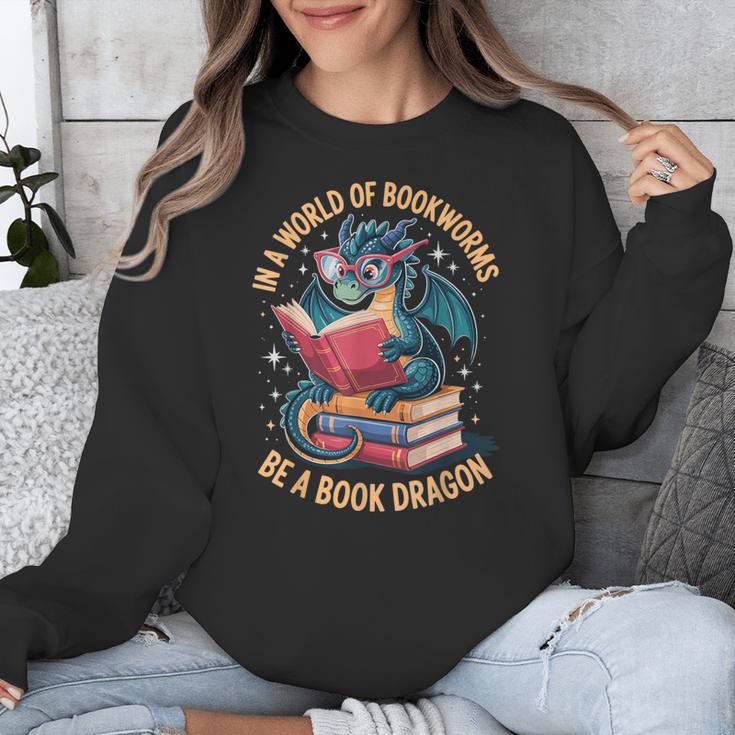 In A World Of Bookworms Be A Book Dragon Unisex Sweatshirt