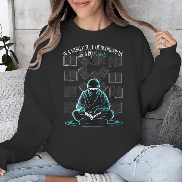 In A World Full Of Bookworms Be A Book Ninja Reading Reader Unisex Sweatshirt