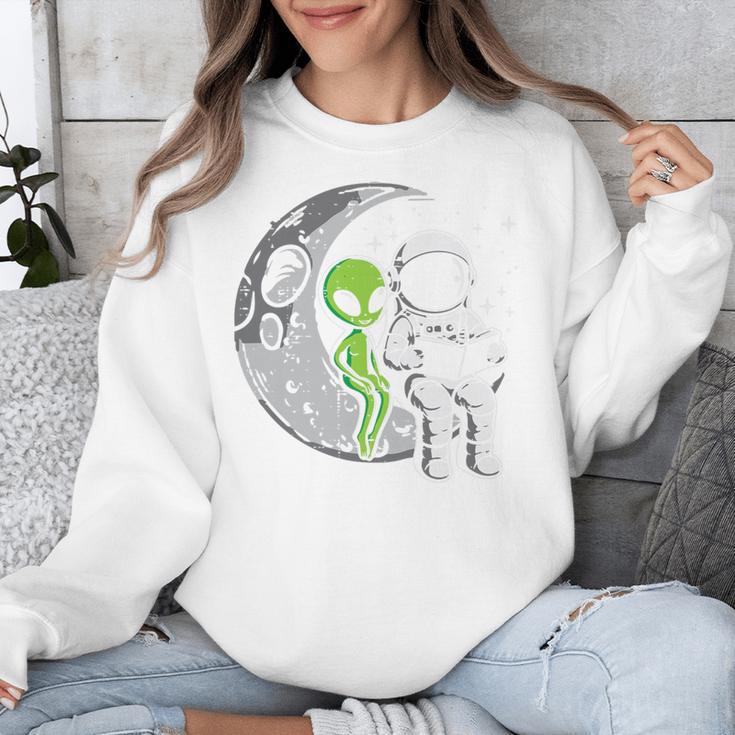Astronaut Reading Book To Alien Moon Space Women Kids Men Premium Tri-Blend Unisex Sweatshirt