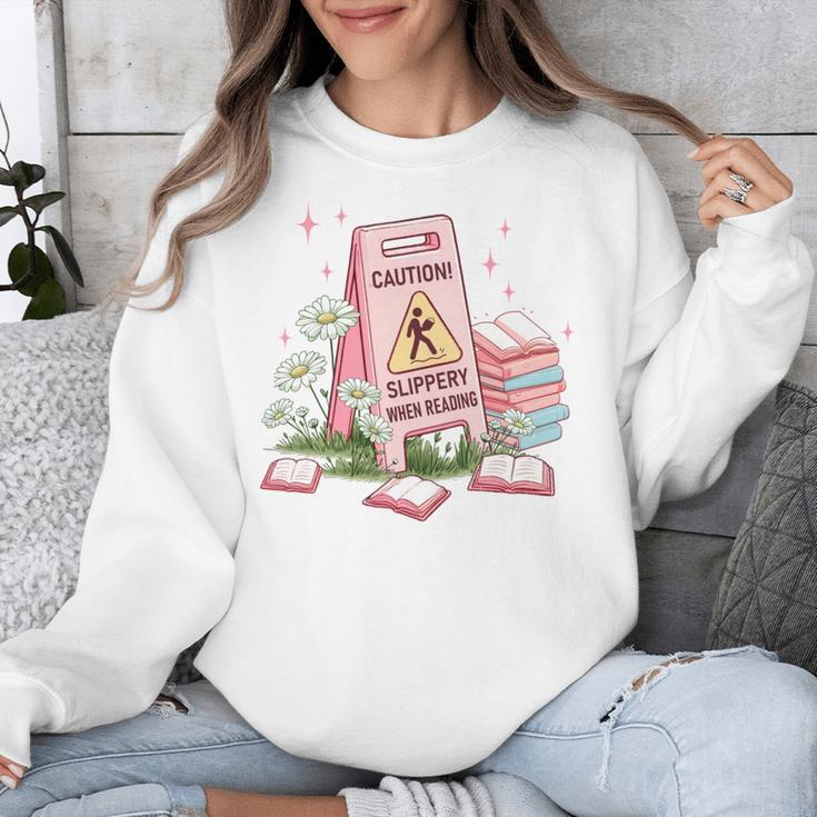 Caution Slippery When Reading Book Reader Unisex Sweatshirt Caution Slippery When Reading Book Reader Unisex Sweatshirt