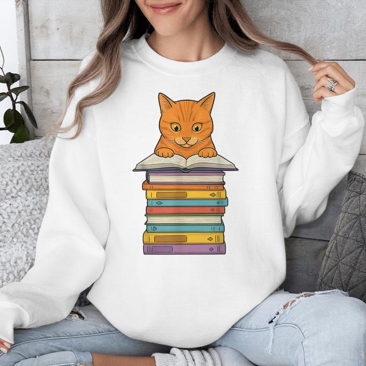 Cute Orange Tabby Cat Reading On Pile Of Books Unisex Sweatshirt Cute Orange Tabby Cat Reading On Pile Of Books Unisex Sweatshirt