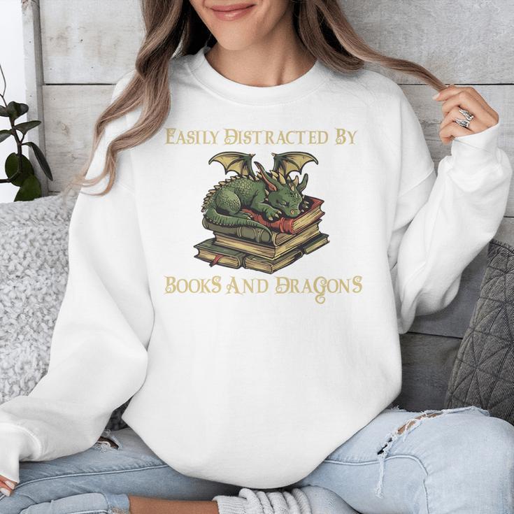 Easily Distracted By Books And Dragons Graphic Premium Unisex Sweatshirt