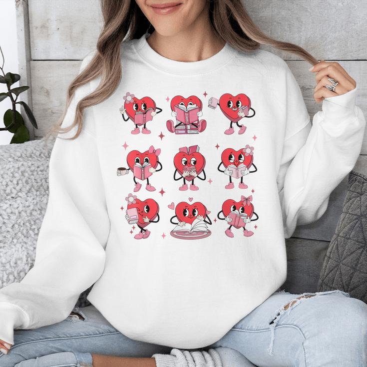 Heart Holding Reading Books Valentine Teacher Book Lover Unisex Sweatshirt