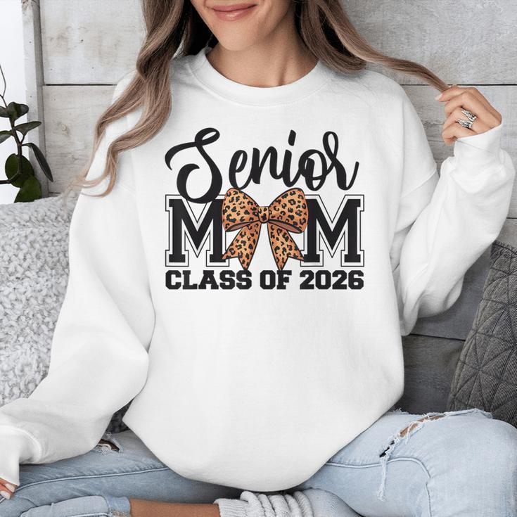 Senior Mom Class Of 2026 Graduation Leopard Coquette Bow Unisex Sweatshirt