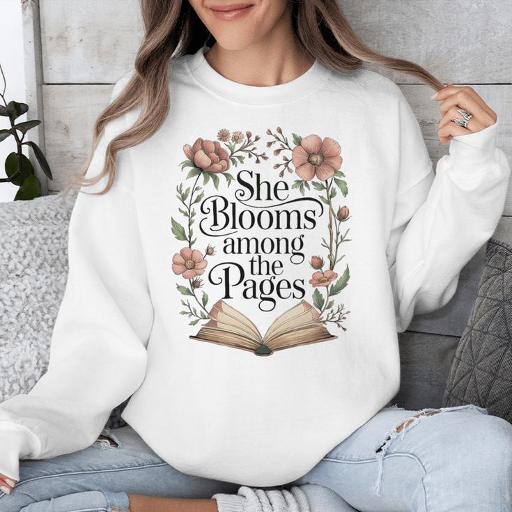 She Blooms Among The Pages Women Mom Wife Floral Book Lover Premium Tri-Blend Unisex Sweatshirt She Blooms Among The Pages Women Mom Wife Floral Book Lover Premium Tri-Blend Unisex Sweatshirt