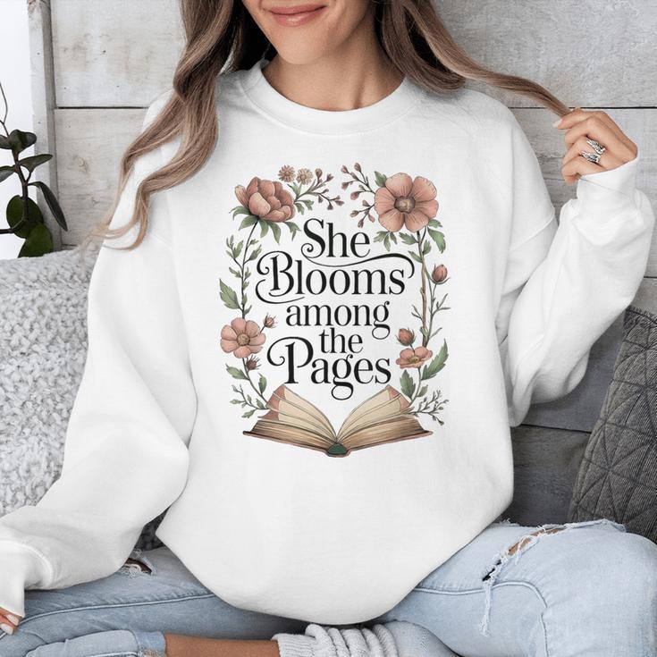She Blooms Among The Pages Women Mom Wife Floral Book Lover Unisex Sweatshirt She Blooms Among The Pages Women Mom Wife Floral Book Lover Unisex Sweatshirt
