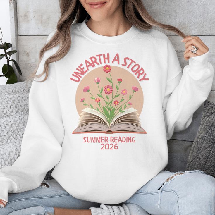 Unearth a Story 2026 Summer Reading Program Flowers Book Premium Tri-Blend Unisex Sweatshirt Unearth a Story 2026 Summer Reading Program Flowers Book Premium Tri-Blend Unisex Sweatshirt