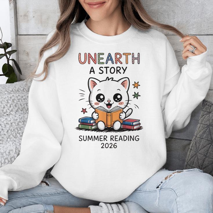 Unearth a Story Cute Kitten Summer Reading 2026 Cat Book Unisex Sweatshirt