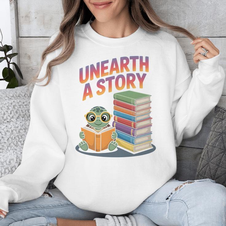 Unearth A Story Cute Turtle Reading Books Librarian Unisex Sweatshirt