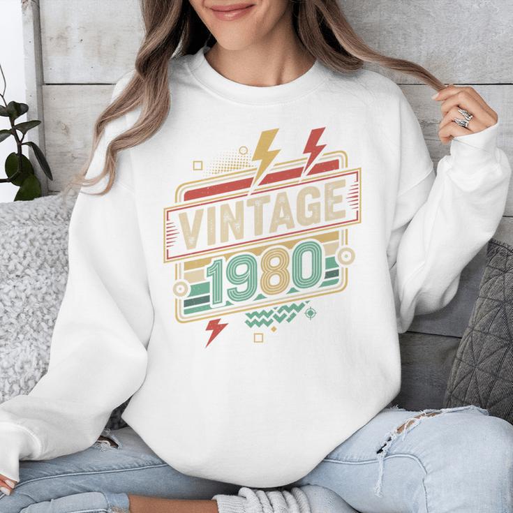 Vintage 1980 Retro Badge Decade Nostalgia Graphic Emblem Premium Tri-Blend Unisex Sweatshirt