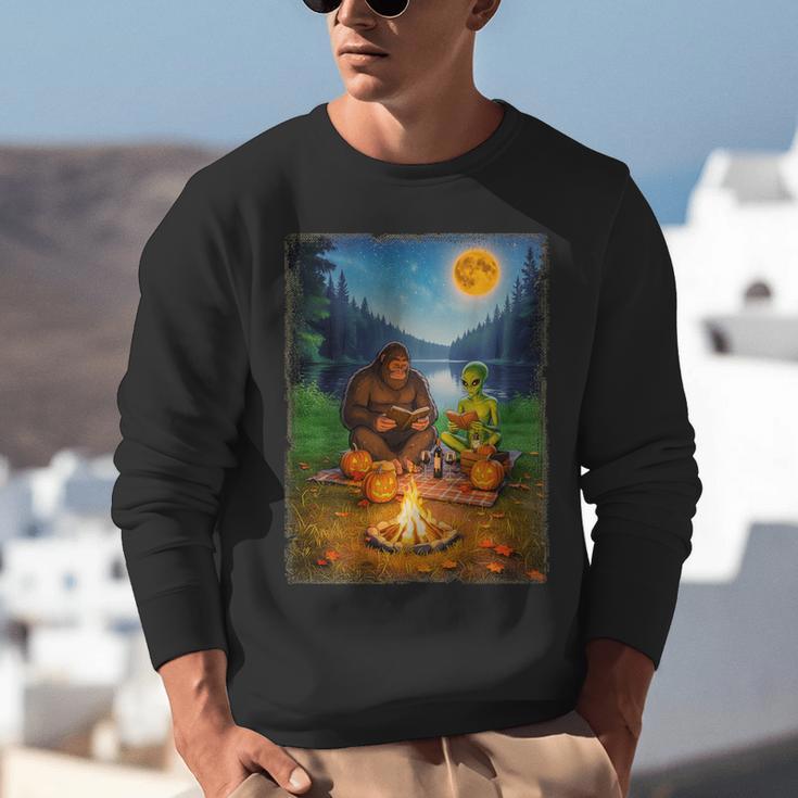Bigfoot And Alien Reading Books Campfire Halloween Unisex Sweatshirt