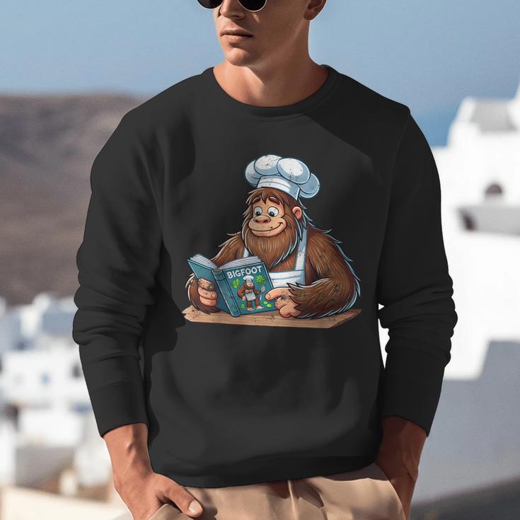 Bigfoot Reading a Cookbook Unisex Sweatshirt