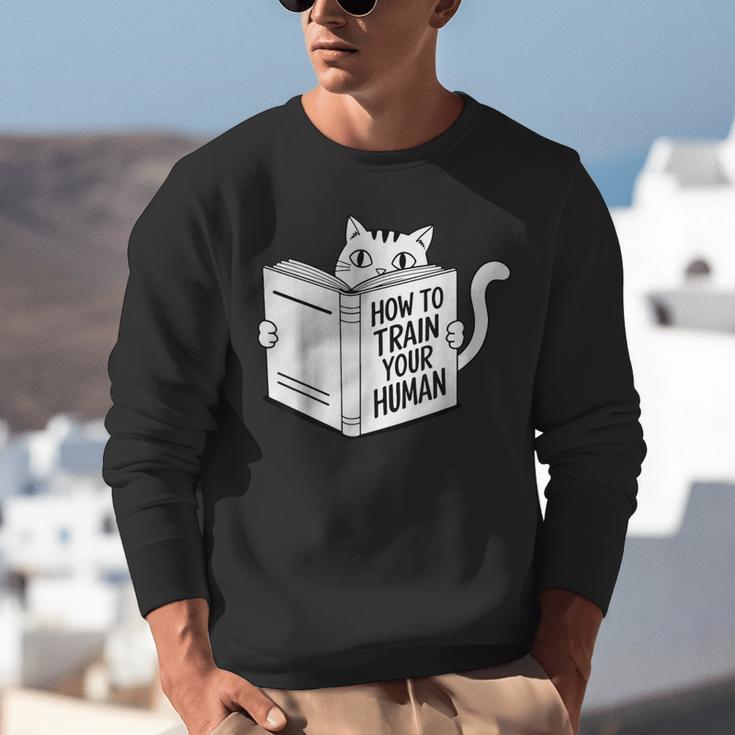 Cat Book Humor How To Train Your Human Unisex Sweatshirt
