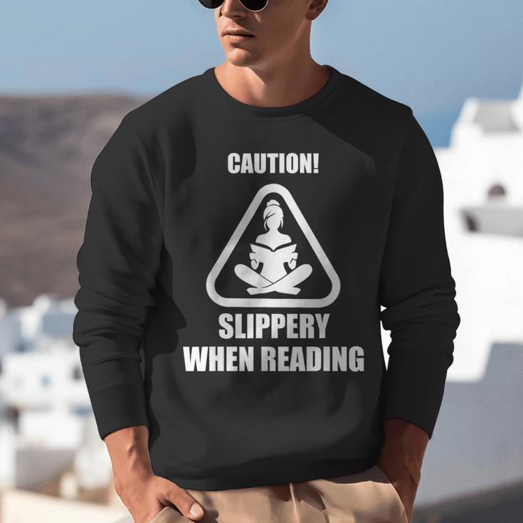 Caution Slippery When Reading Book Lover Unisex Sweatshirt