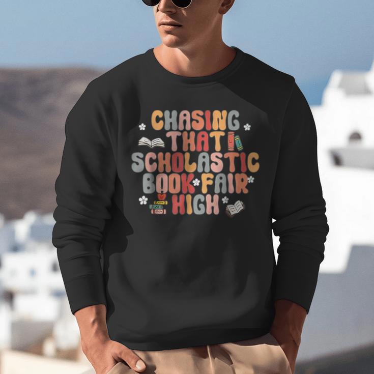 CHASING THAT SCHOLASTIC BOOK FAIR HIGH Unisex Sweatshirt