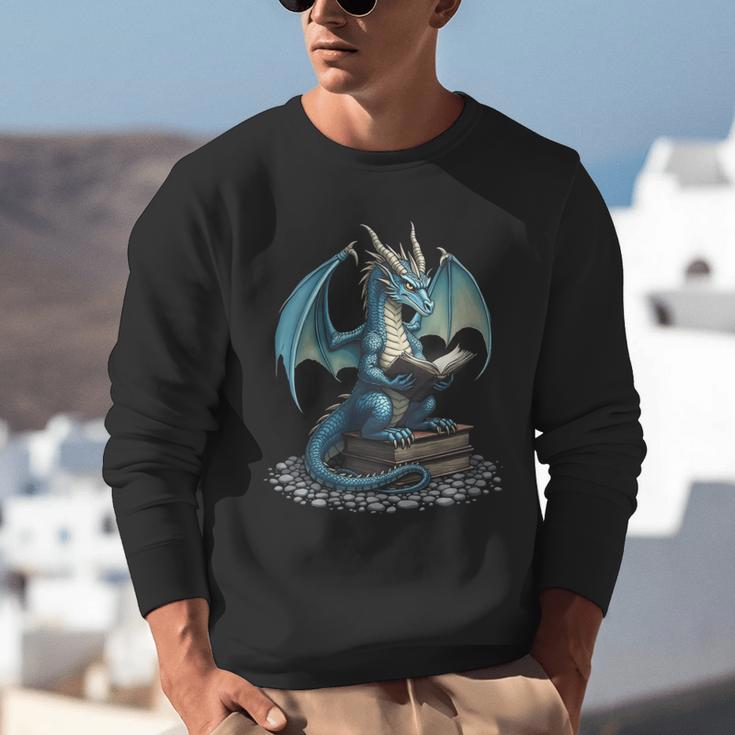 Fantasy Dragon Reading Magical Book Lover Halloween Vibes Unisex Sweatshirt Fantasy Dragon Reading Magical Book Lover Halloween Vibes Unisex Sweatshirt
