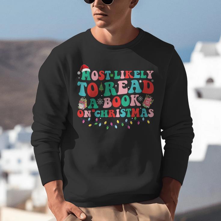 Groovy Christmas Most Likely To Read A Book On Christmas Unisex Sweatshirt