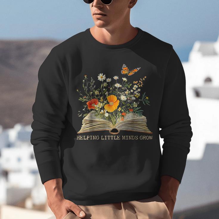 Helping Little Minds Grow Floral Book Education SPED Teacher Unisex Sweatshirt Helping Little Minds Grow Floral Book Education SPED Teacher Unisex Sweatshirt