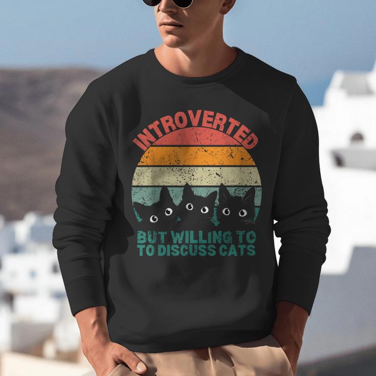 Introverted But Willing To Discuss Cats Unisex Sweatshirt Introverted But Willing To Discuss Cats Unisex Sweatshirt