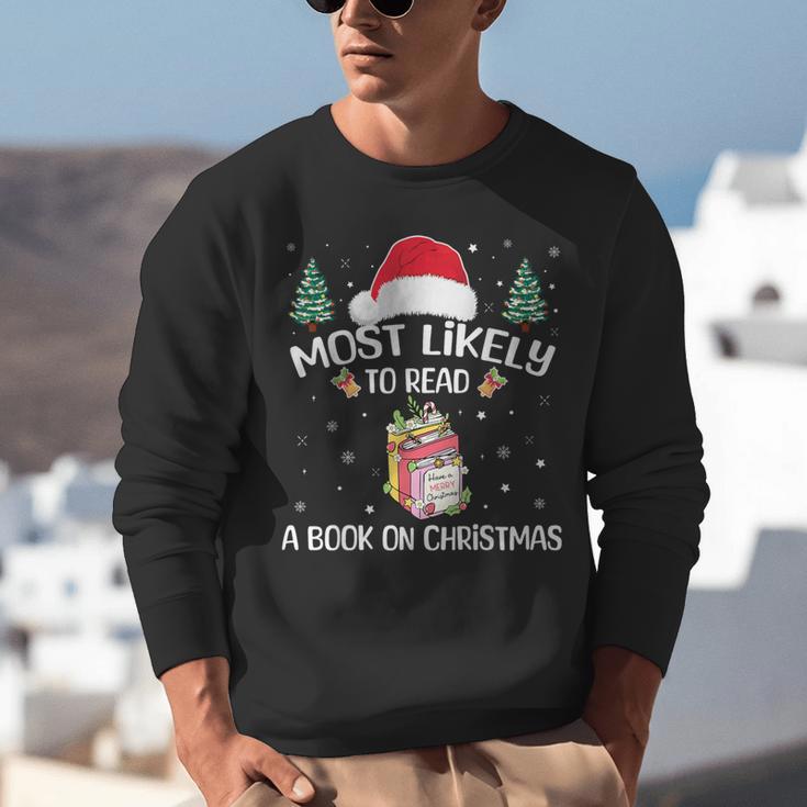 Most Likely To Read A Book On Christmas Love Reading Books Unisex Sweatshirt