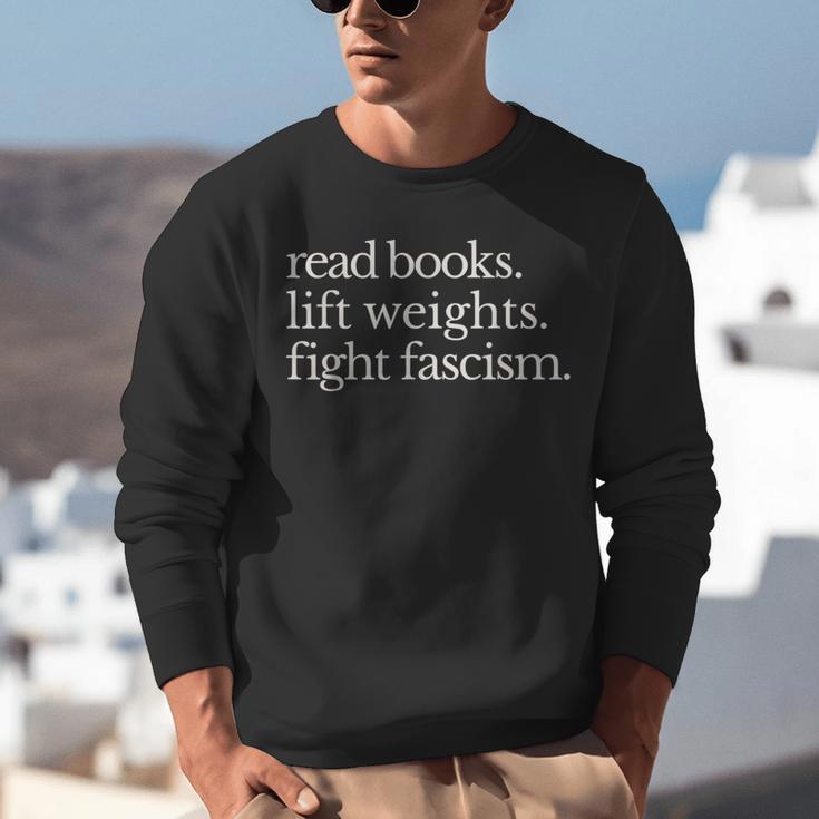 Read Books Lift Weights Fight Fascism Unisex Sweatshirt Read Books Lift Weights Fight Fascism Unisex Sweatshirt